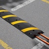 image:imageVEVOR 6FT Rubber Driveway Speed Bumps for Road2PCS Heavy Duty 2 Channel Modular Traffic Speed Humps 22000 lbsAxle Load Capacity 72 Cable Protector Ramp with Screws for Asphalt Concrete Gravel2 Pack6FT