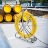 image:imageVEVOR Fish Tape Fiberglass 656 ft 516 in Duct Rodder Fishtape Wire Puller Cable Running Rod with Steel Reel Stand 3 Pulling Heads Fishing Tools for Walls and Electrical Conduit NonConductive516inch 656FT